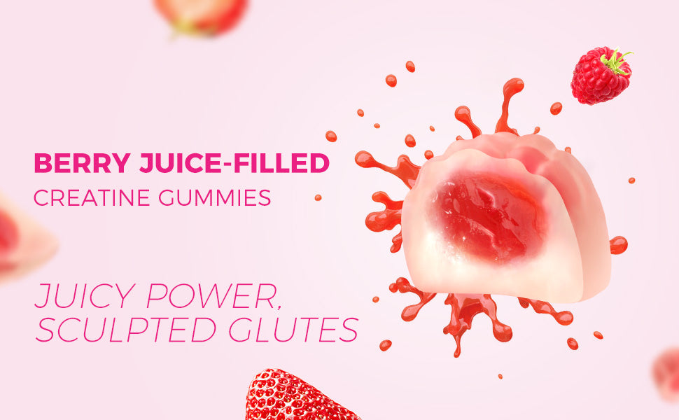 Berry juice-filled creatine gummies with strawberry slices on a pink background